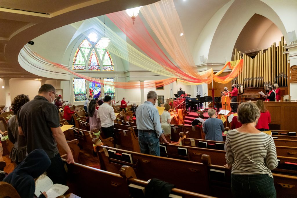 FCCA’s sanctuary is adorned with stained glass, curved ceilings and archways, curved pews on a gradient slope and a raised chancel.